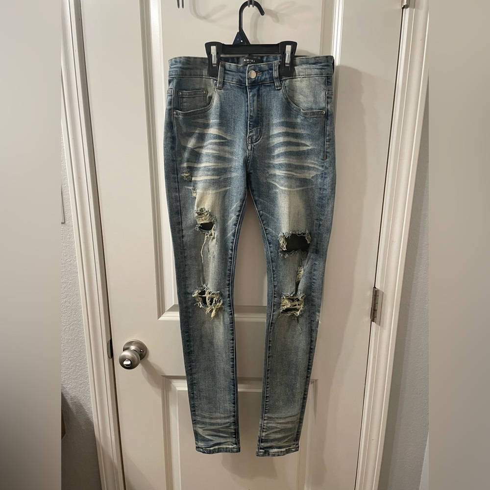 AMIRI Faded Blue Distressed Skinny Jeans